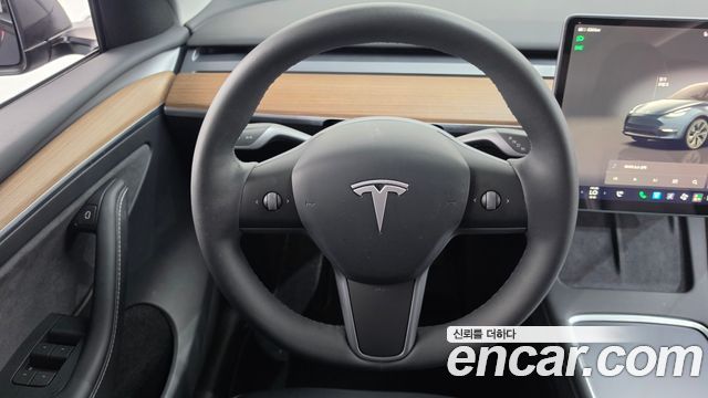 Tesla Model Y 2024 — photo 20