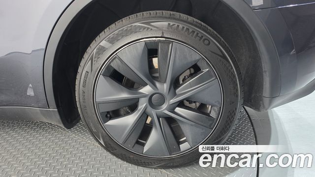 Tesla Model Y 2024 — photo 7