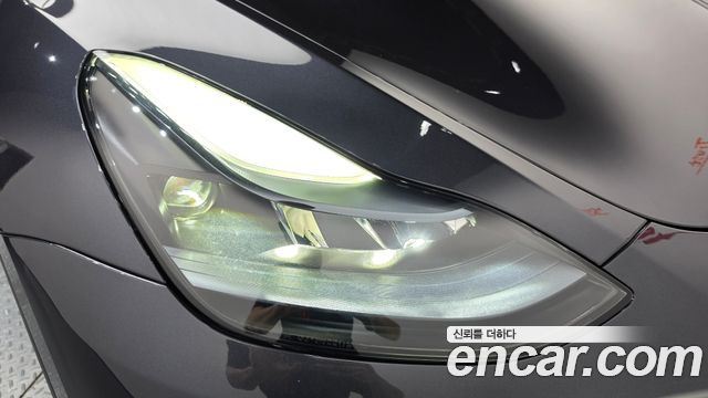 Tesla Model Y 2024 — photo 8