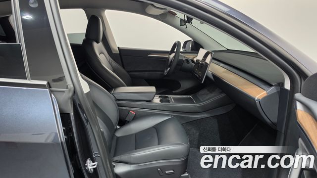 Tesla Model Y 2024 — photo 16