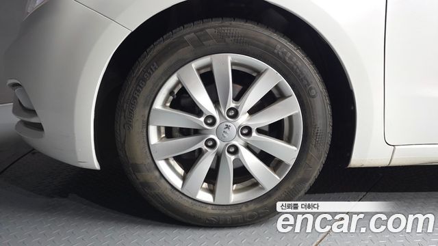 Kia K3 2013 — photo 5