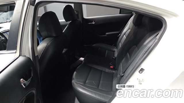 Kia K3 2013 — photo 11