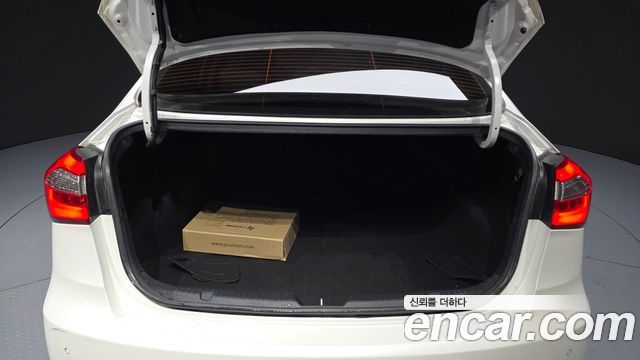 Kia K3 2013 — photo 17