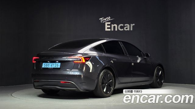 Tesla Model 3 2024 — photo 2