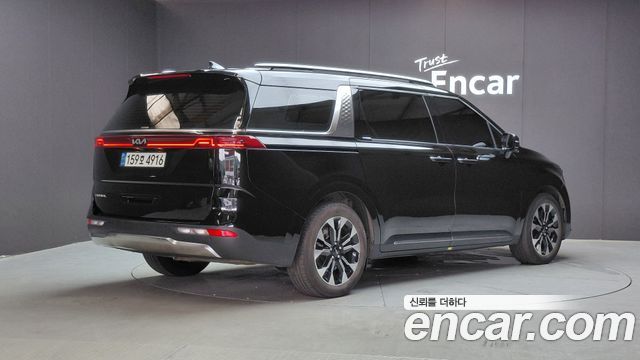 Kia Canival 2023 — photo 2