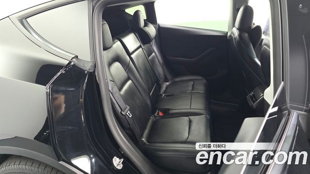 Tesla Model Y 2022 — photo 16