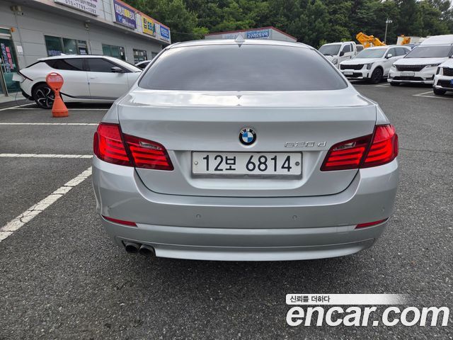 BMW 5-Series 2011 — photo 4