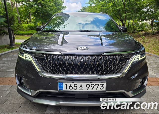 Kia Canival 2021 — photo 2