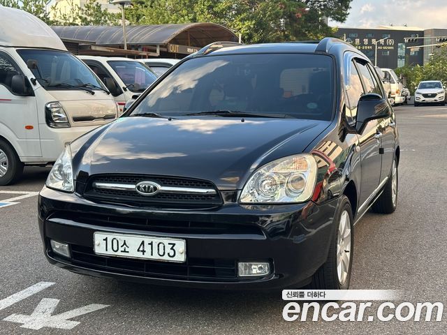 Kia Carens 2007 — photo 1