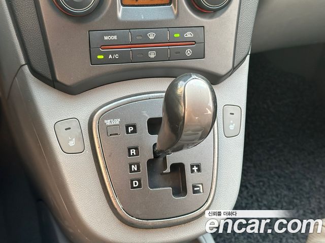 Kia Carens 2007 — photo 12
