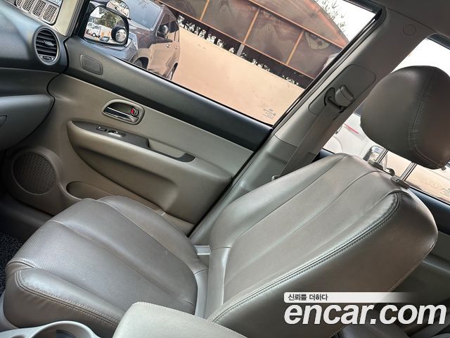 Kia Carens 2007 — photo 17