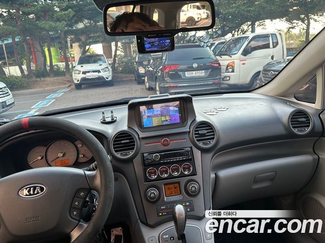 Kia Carens 2007 — photo 18