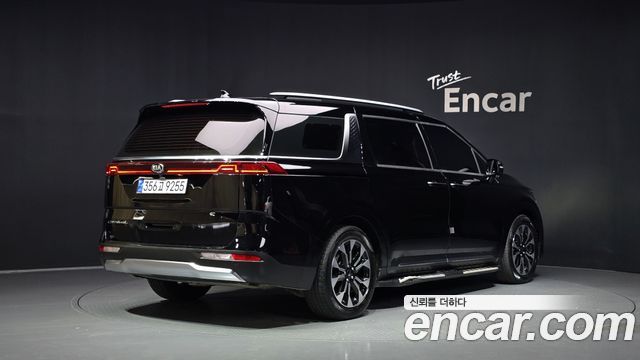 Kia Canival 2021 — photo 2