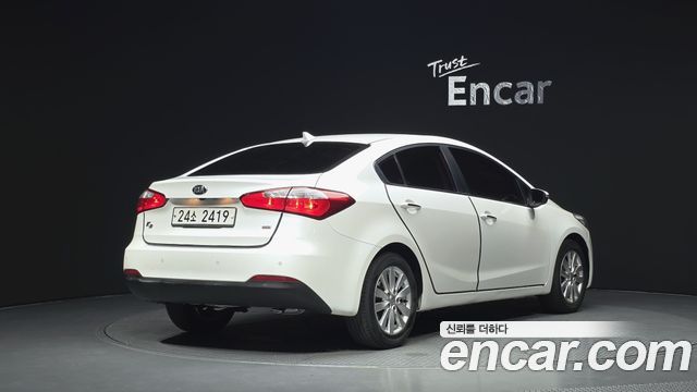 Kia K3 2013 — photo 2
