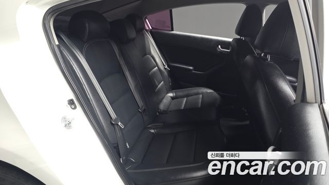 Kia K3 2013 — photo 17