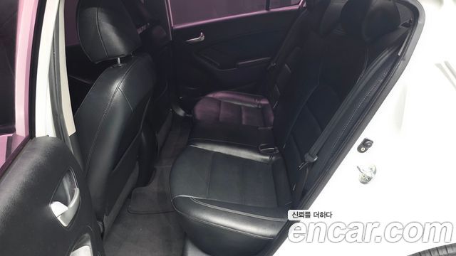Kia K3 2013 — photo 18