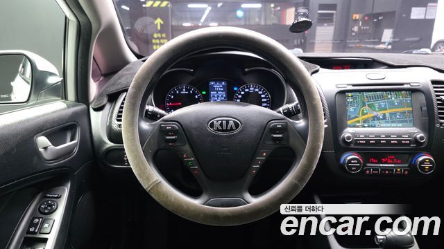 Kia K3 2013 — photo 19