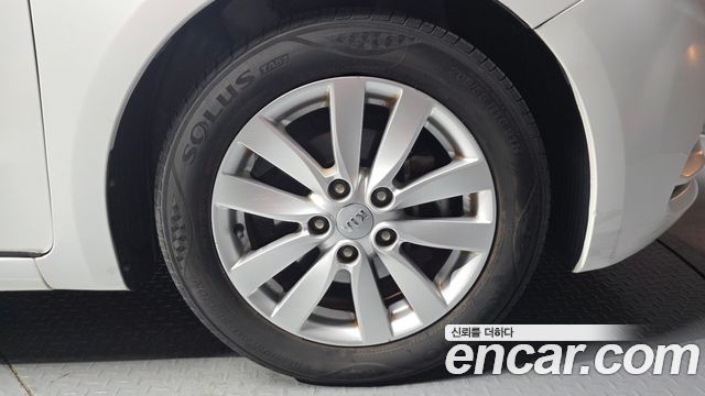 Kia K3 2013 — photo 7