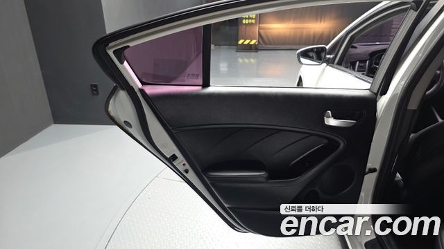 Kia K3 2013 — photo 15