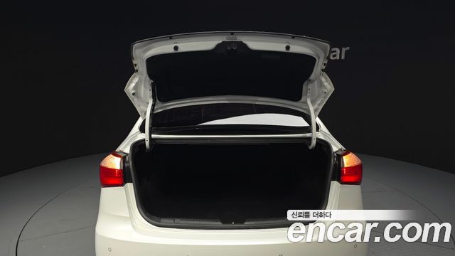 Kia K3 2013 — photo 28