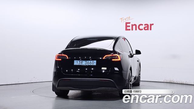 Tesla Model Y 2024 — photo 4