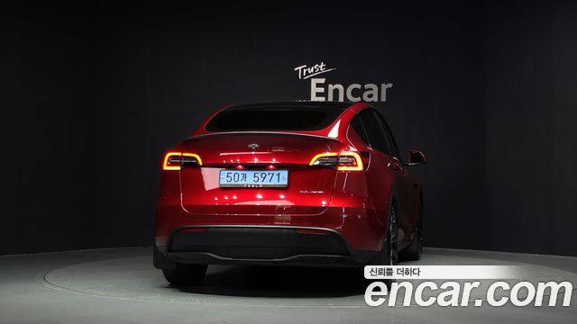 Tesla Model Y 2024 — photo 4
