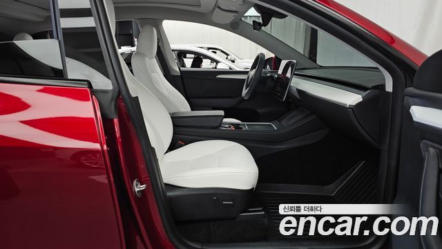 Tesla Model Y 2024 — photo 11