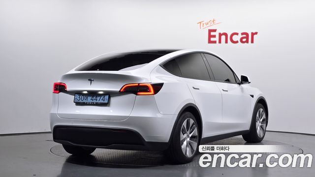 Tesla Model Y 2021 — photo 2