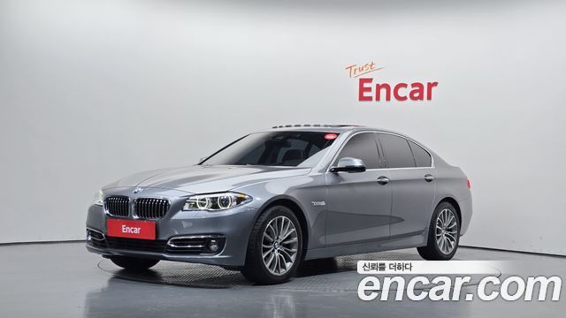 BMW 5-Series 2015 — photo 1