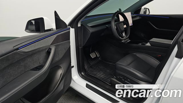 Tesla Model Y 2025 — photo 17