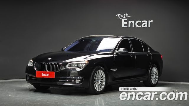 BMW 7-Series 2014 — photo 1