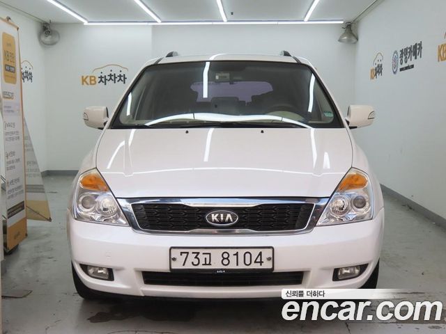 Kia Canival 2012 — photo 1