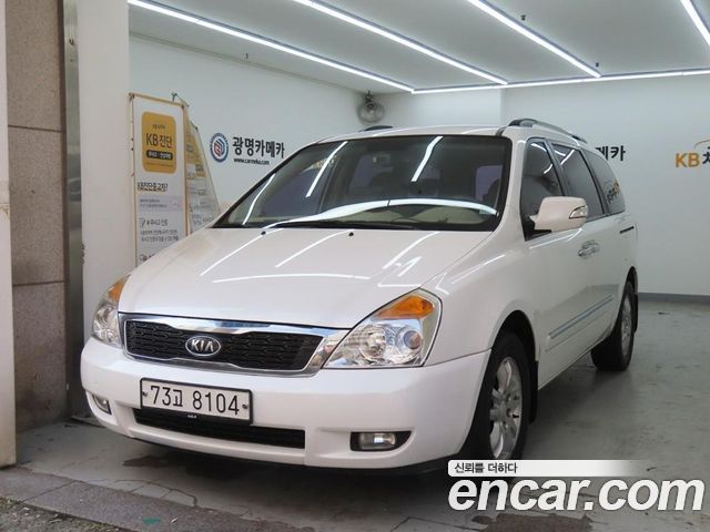 Kia Canival 2012 — photo 2