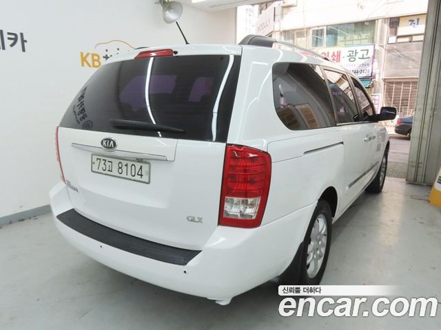 Kia Canival 2012 — photo 3