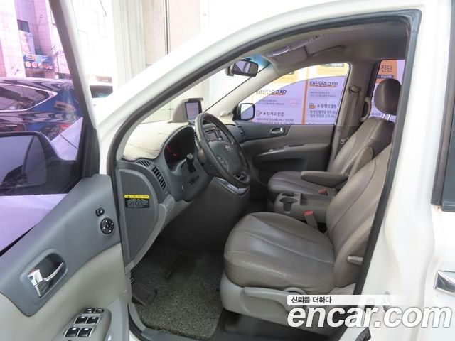 Kia Canival 2012 — photo 5