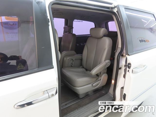 Kia Canival 2012 — photo 6