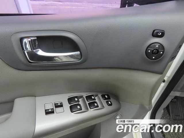 Kia Canival 2012 — photo 9