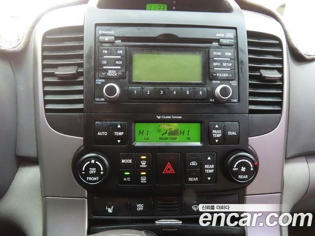 Kia Canival 2012 — photo 11