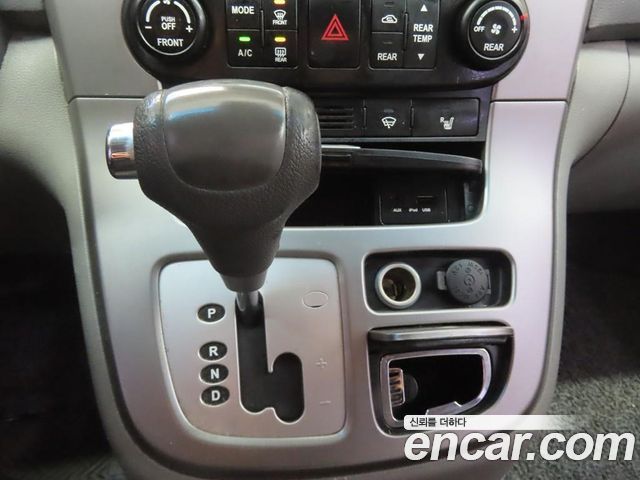 Kia Canival 2012 — photo 12