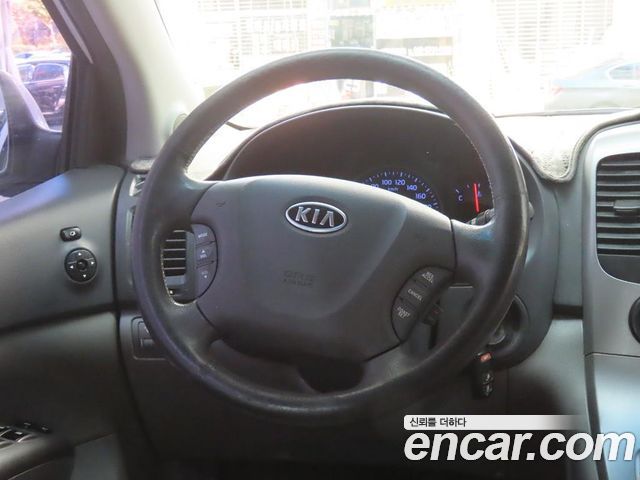 Kia Canival 2012 — photo 19