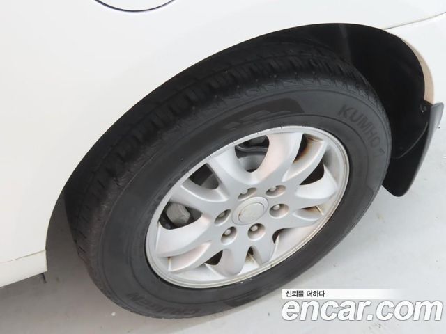 Kia Canival 2012 — photo 20