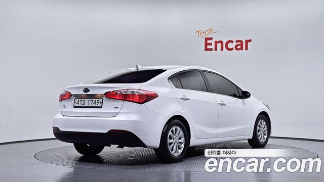 Kia K3 2013 — photo 2