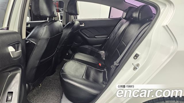 Kia K3 2013 — photo 18