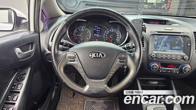 Kia K3 2013 — photo 19