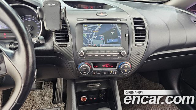 Kia K3 2013 — photo 20