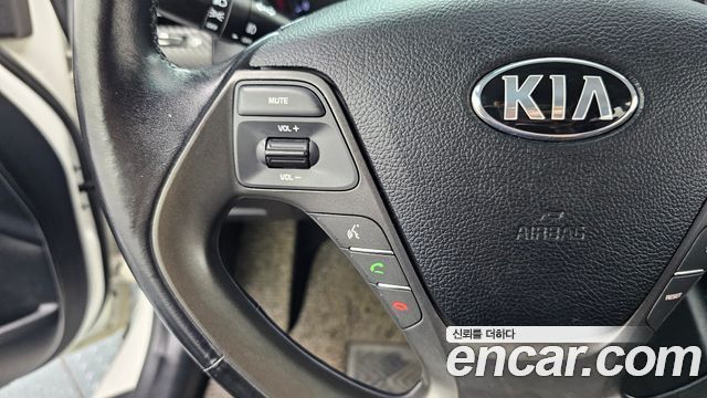 Kia K3 2013 — photo 26