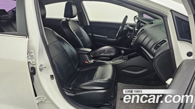 Kia K3 2013 — photo 16