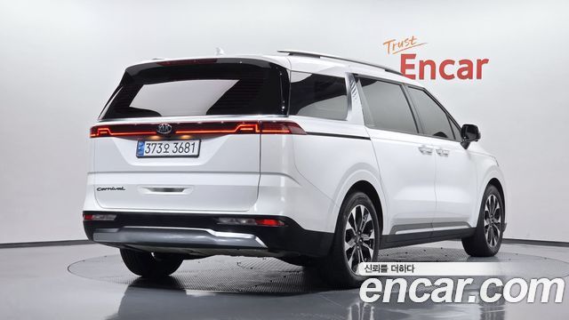 Kia Canival 2021 — photo 2