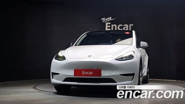 Tesla Model Y 2024 — photo 3