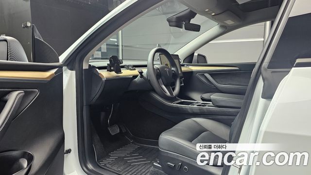 Tesla Model Y 2024 — photo 13